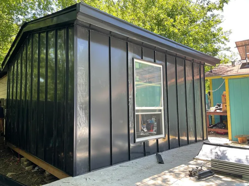 Black standing seam metal wall panels for Metal Roof Installation in Delano